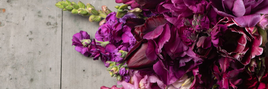 Bouquet of flowers in deep purple and maroon.